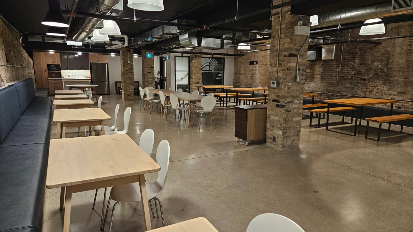 The Builders Cellar with exposed brick and long tables